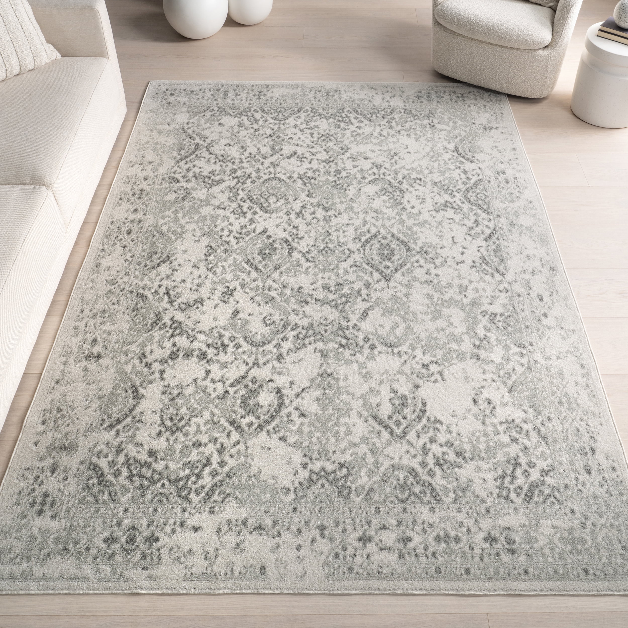 Gray and Ivory Floral Synthetic 5' x 7' Area Rug