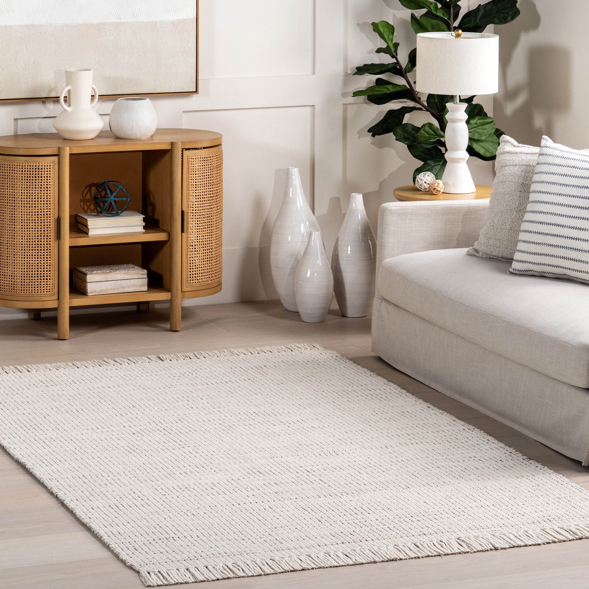 Handmade Ivory Wool Rectangular Area Rug with Fringe