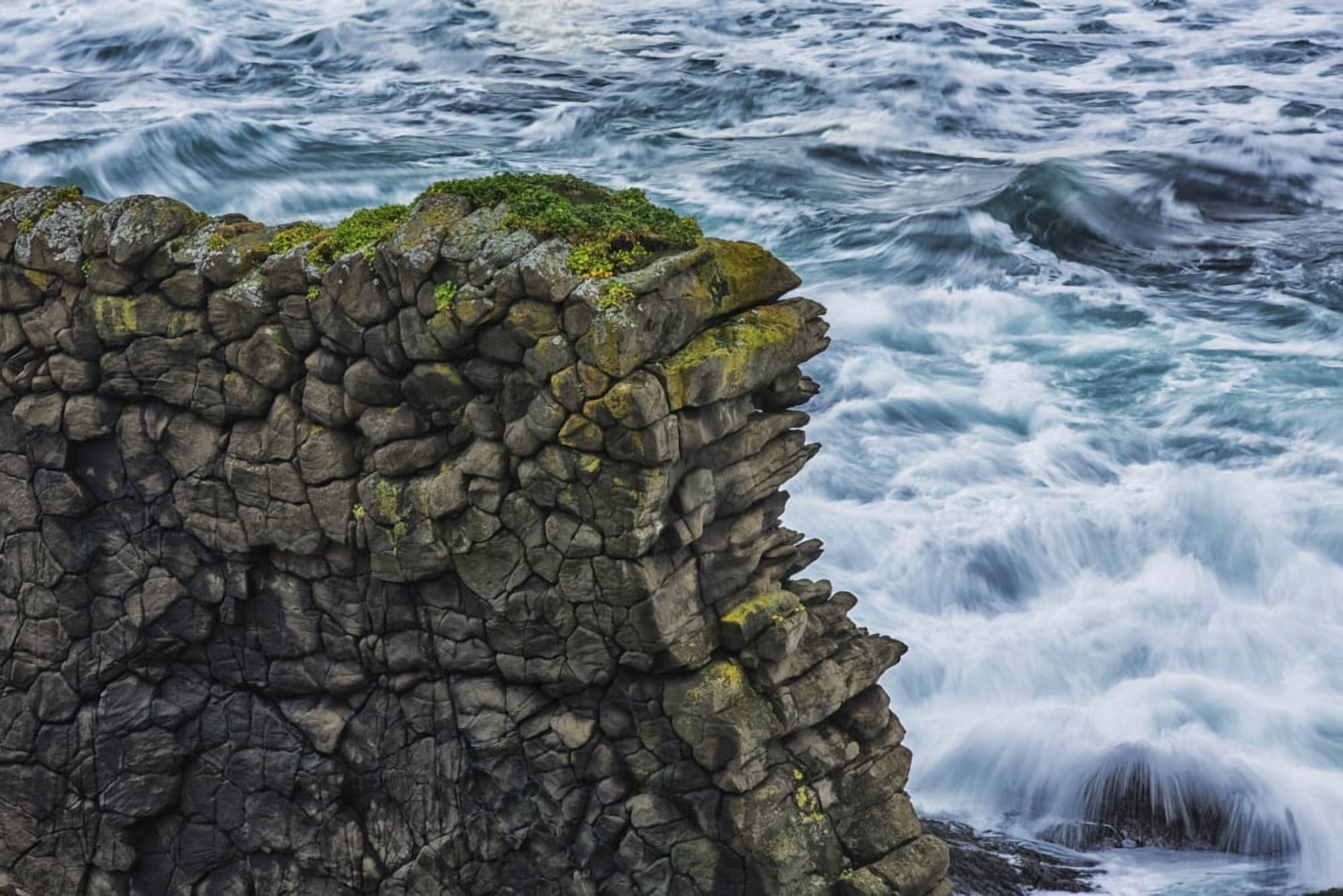 An old horizontal lava flow creates a wall of hexagonal rocks along the Strandir coast which is located in the West Fjords of northwest Iceland Iceland Canvas Art - Robert Postma Design Pics (19 x 12