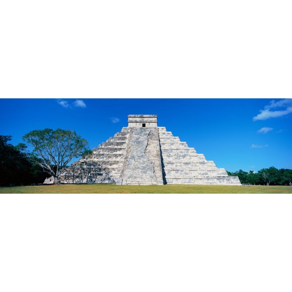 A panoramic view of the Mayan Pyramid of Kukulkan (also known as El Castillo) and ruins at Chichen Itza Yucatan Peninsula Mexico Canvas Art - Panoramic Images (27 x 9)