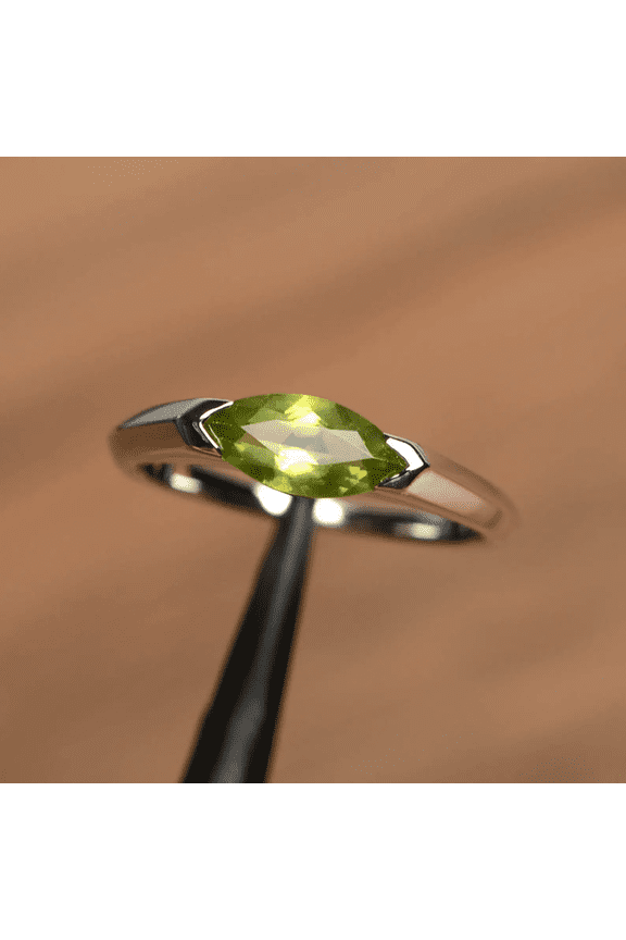 peridot ring silver marquise cut horizontal setting solitaire engagement ring August birthstone