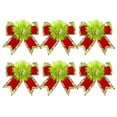 thumbnail image 1 of putnchl The Red And Green Christmas Bow Christmas Tree Is Decorated With A Lime Green Wreath, A Velvet Bow, And A Tree Top Ribbon., 1 of 4