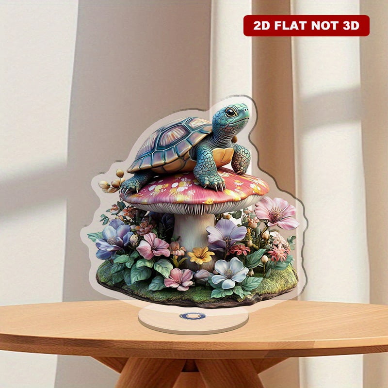 A rotating acrylic display featuring a vibrant turtle on a mushroom ...