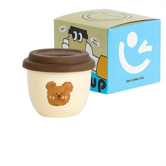 A small 8.28 ounce coffee mug, perfect for sipping a delicate cup of coffee; an adorable bear-shaped teacup with a lid, suitable for home and office use; ideal as a gift for couples, graduations, bes