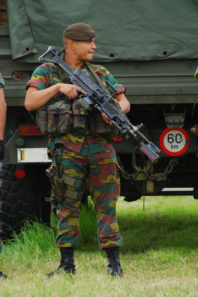 A soldier of an infantry unit of the Belgian Army posing with a FNC rifle with a laser guided tool Canvas Art - Luc De JaegerStocktrek Images (23 x 34)