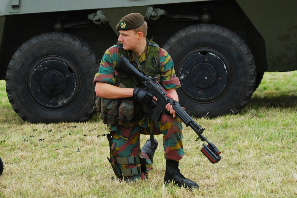 A soldier of an infantry unit of the Belgian Army posing with a FNC rifle with a laser guided tool Canvas Art - Luc De JaegerStocktrek Images (34 x 23)
