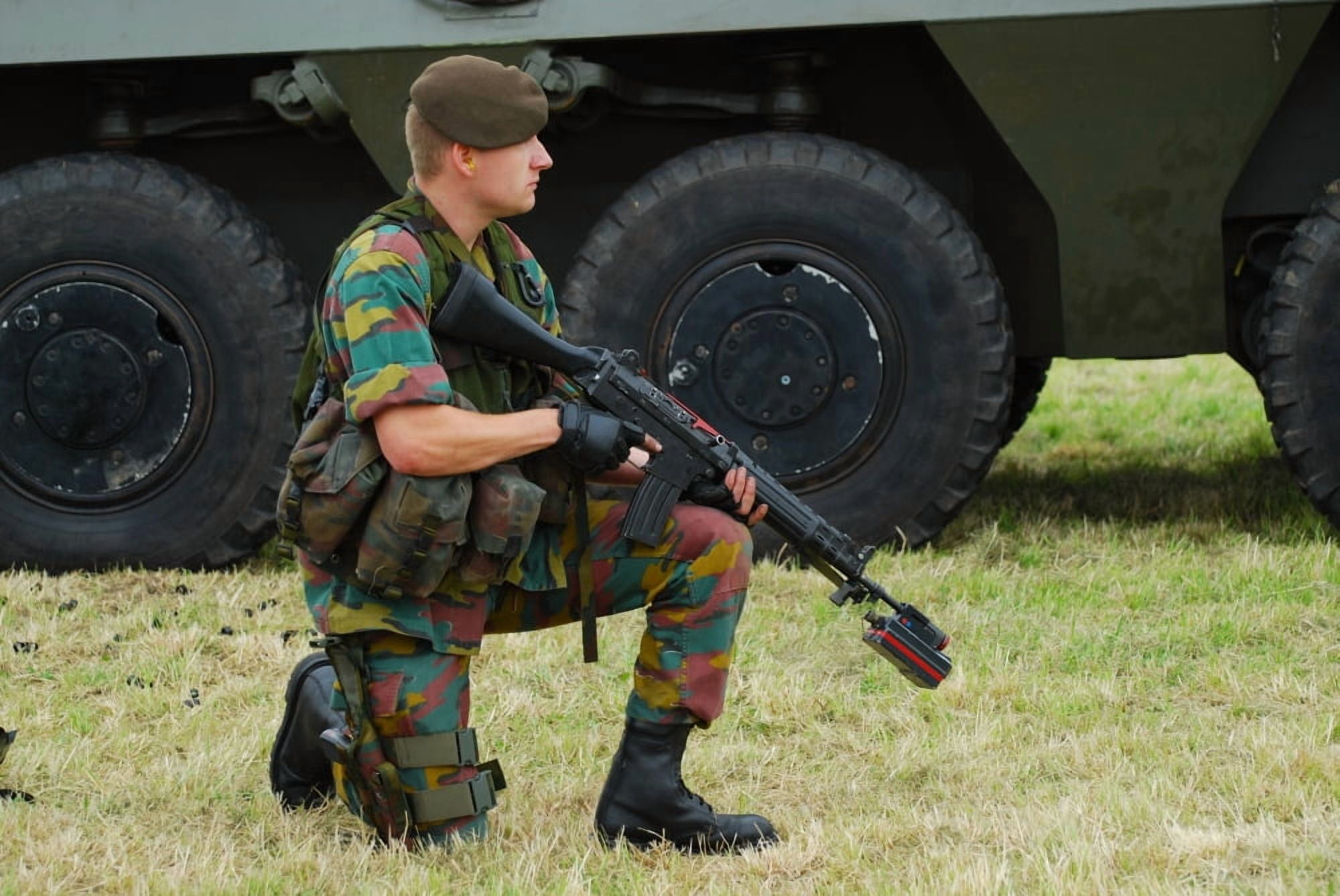 A soldier of an infantry unit of the Belgian Army posing with a FNC rifle with a laser guided tool Canvas Art - Luc De JaegerStocktrek Images (34 x 23)