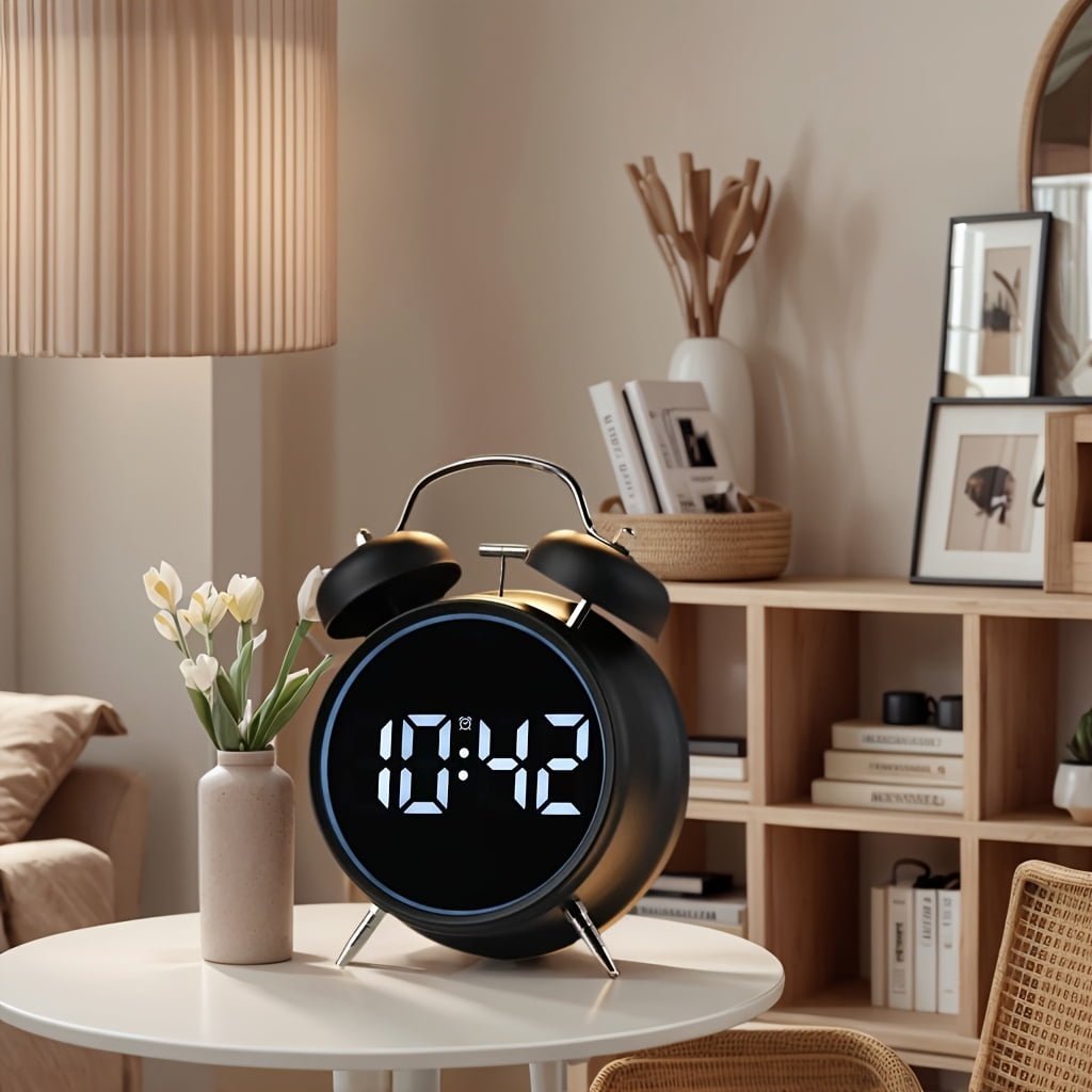 This is a stylish metal alarm clock with a night light and a variety of features, including temperature and date displays. It operates quietly without ticking and has both weekday and weekend alarm s
