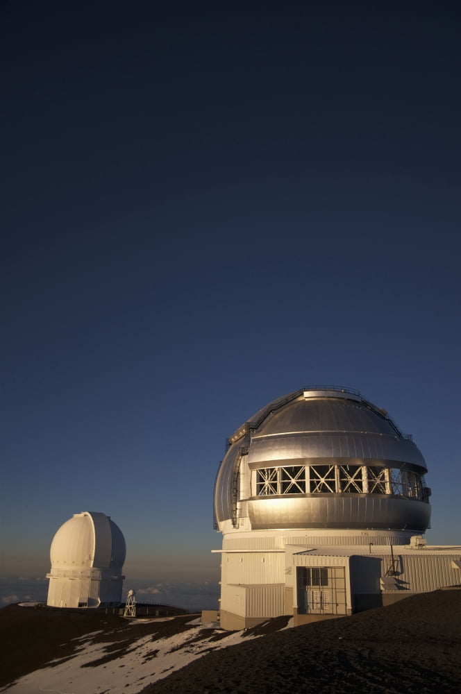 The sun sets over the summit of Mauna Kea and the domed observatories and telescopes Island of Hawaii Hawaii United States of America Canvas Art - James MacDonald Design Pics (13 x 20)