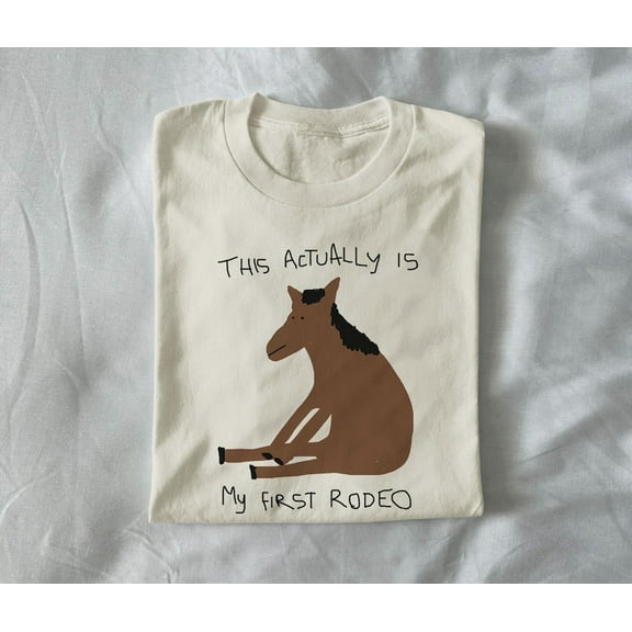 this is my first rodeo - unisex t shirt, funny t shirt, silly t shirt, weird graphic tee, meme cowboy, cowboy meme, horse t shirt,