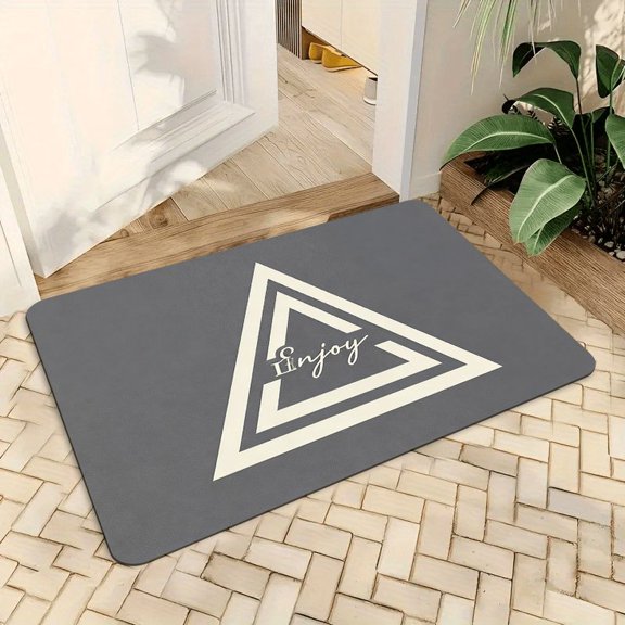 A triangular letter-shaped floor mat made of highly absorbent diatomaceous earth, machine washable. Suitable for entryways, kitchens, bathrooms, living rooms, bedrooms, and studies.