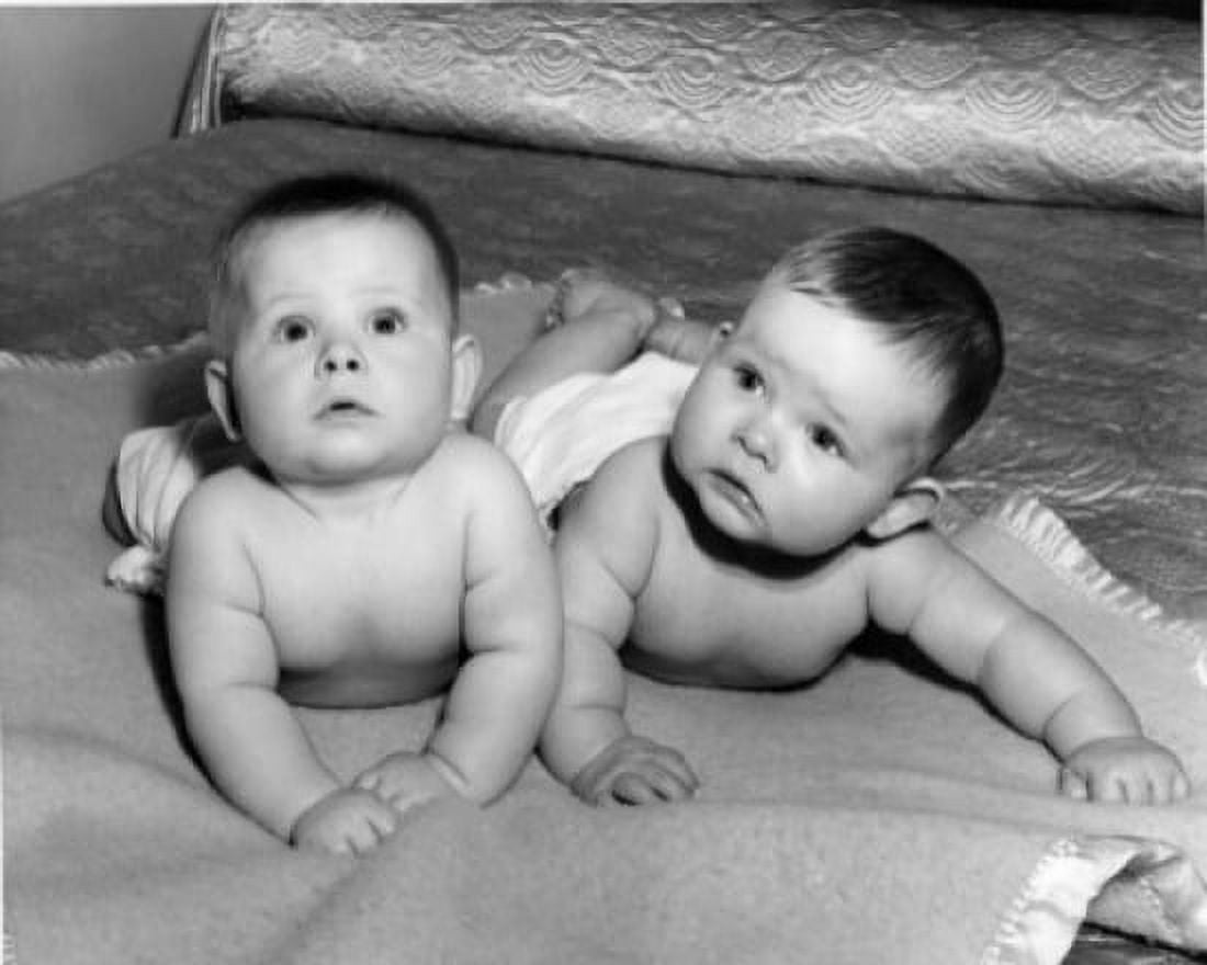 two babies lying on bed Canvas Art - (24 x 36)