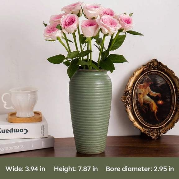 This vintage distressed light green ceramic vase features a textured horizontal ribbed finish and a smooth glazed surface, exuding wabi-sabi charm. It measures 2.95" in opening diameter, 3.94" in wid