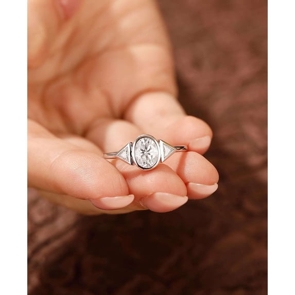 vylahjewellery Women's Oval Cut Moissanite Engagement Anniversary Ring, 14K Vermeil White Gold Bezel Set with Trillion Cut Side Stones Proposal Rings Promise Wedding Ring