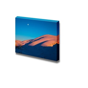 wall26 Beautiful Winter Landscape High Majestic Mountains Covered with White Snow in Bright Sunset Light Small Moon in Clear Blue Sky - Canvas Art Wall Art - 32" x 48"