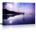 thumbnail image 1 of wall26 - Canvas Prints Wall Art - Silhouette of a Beautiful Young Girl Dancing on the Beach at the Sunrise in Purple Colors - 12" x 18", 1 of 4