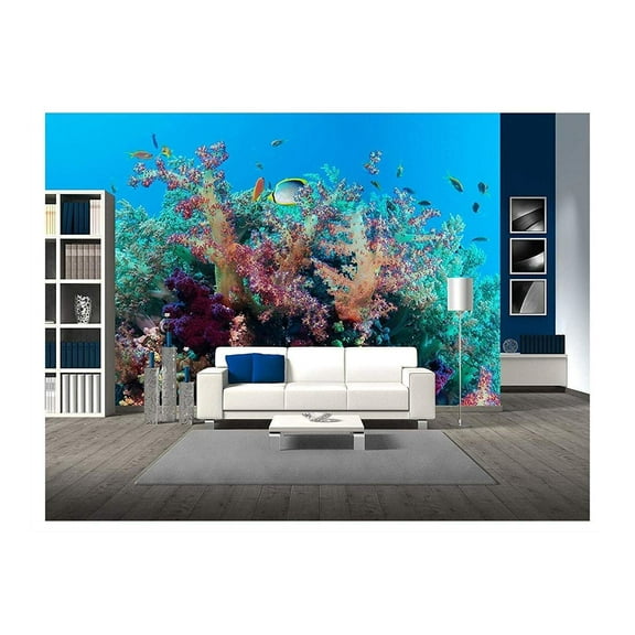 wall26 - Colorful Underwater Offshore Rocky Reef with Coral and sponges and Small Tropical Fish Swimming by in a Blue Ocean - Removable Wall Mural | Self-Adhesive Large Wallpaper - 100x144 inches