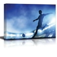 thumbnail image 1 of wall26 Football Soccer Match a Player Shooting on Goal Lights on The Stadium at Night - Canvas Art Wall Art - 12" x 18", 1 of 4