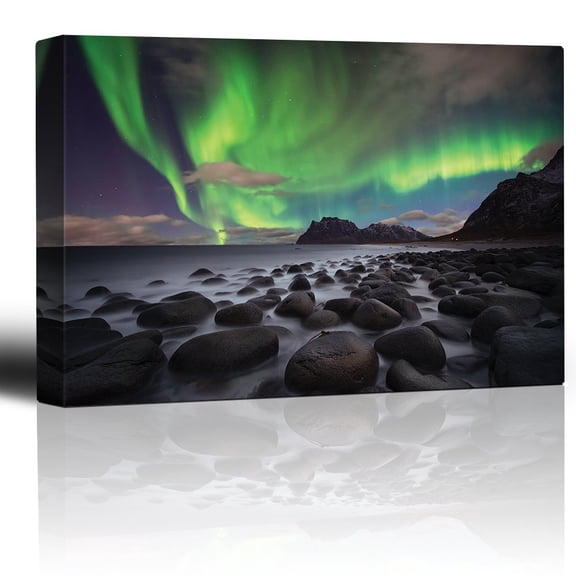 wall26 - Green Northern Lights Over an Ocean Filled with Rocks - Canvas Art Home Art - 24x36 inches